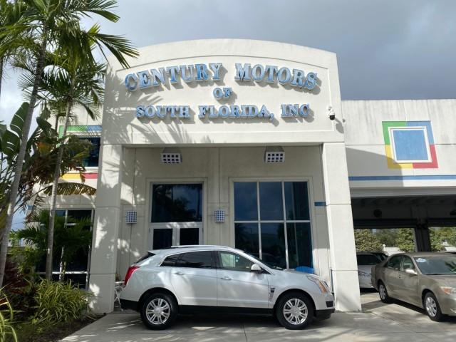 2012 Platinum Ice Tricoat /Shale w/Brownstone accents Cadillac SRX Luxury Collection LOW MILES 44,412 AWD (3GYFNDE32CS) with an 3.6L SIDI DOHC V6 VVT Engine engine, Automatic transmission, located at 4701 North Dixie Hwy, Pompano Beach, FL, 33064, (954) 422-2889, 26.240938, -80.123474 - OUR WEBPAGE FLORIDACARS1.COM HAS OVER 100 PHOTOS AND FREE CARFAX LINK 2012 Cadillac SRX Luxury Collection 1 OWNER 4 Door Wagon/Sport Utility 3.6L V6 F DOHC 24V Gasoline 24 MPG All Wheel Drive Features 4WD/AWD ABS Brakes Air Conditioning Alloy Wheels AM/FM Stereo Automatic Transmission Auxiliary Audi- Photo#0