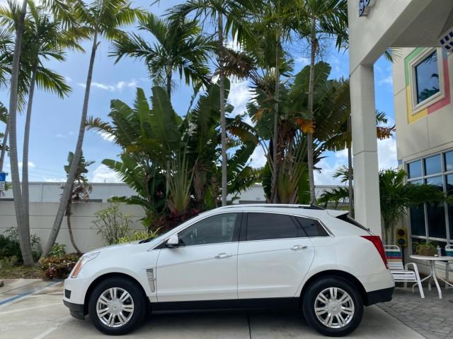 2012 Platinum Ice Tricoat /Shale w/Brownstone accents Cadillac SRX Luxury Collection LOW MILES 44,412 AWD (3GYFNDE32CS) with an 3.6L SIDI DOHC V6 VVT Engine engine, Automatic transmission, located at 4701 North Dixie Hwy, Pompano Beach, FL, 33064, (954) 422-2889, 26.240938, -80.123474 - OUR WEBPAGE FLORIDACARS1.COM HAS OVER 100 PHOTOS AND FREE CARFAX LINK 2012 Cadillac SRX Luxury Collection 1 OWNER 4 Door Wagon/Sport Utility 3.6L V6 F DOHC 24V Gasoline 24 MPG All Wheel Drive Features 4WD/AWD ABS Brakes Air Conditioning Alloy Wheels AM/FM Stereo Automatic Transmission Auxiliary Audi- Photo#4