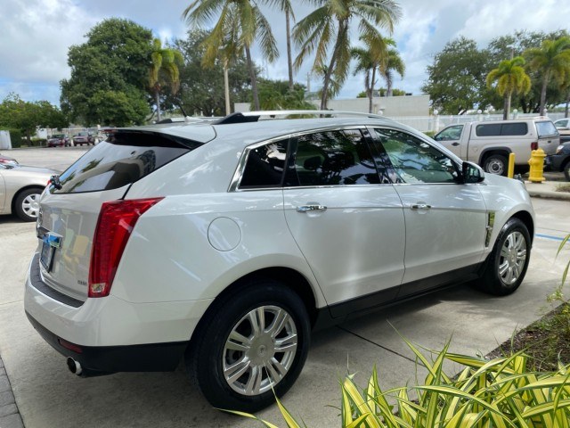 2012 Platinum Ice Tricoat /Shale w/Brownstone accents Cadillac SRX Luxury Collection LOW MILES 44,412 AWD (3GYFNDE32CS) with an 3.6L SIDI DOHC V6 VVT Engine engine, Automatic transmission, located at 4701 North Dixie Hwy, Pompano Beach, FL, 33064, (954) 422-2889, 26.240938, -80.123474 - OUR WEBPAGE FLORIDACARS1.COM HAS OVER 100 PHOTOS AND FREE CARFAX LINK 2012 Cadillac SRX Luxury Collection 1 OWNER 4 Door Wagon/Sport Utility 3.6L V6 F DOHC 24V Gasoline 24 MPG All Wheel Drive Features 4WD/AWD ABS Brakes Air Conditioning Alloy Wheels AM/FM Stereo Automatic Transmission Auxiliary Audi- Photo#7