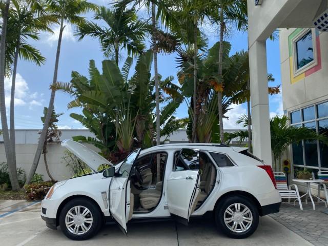 2012 Platinum Ice Tricoat /Shale w/Brownstone accents Cadillac SRX Luxury Collection LOW MILES 44,412 AWD (3GYFNDE32CS) with an 3.6L SIDI DOHC V6 VVT Engine engine, Automatic transmission, located at 4701 North Dixie Hwy, Pompano Beach, FL, 33064, (954) 422-2889, 26.240938, -80.123474 - OUR WEBPAGE FLORIDACARS1.COM HAS OVER 100 PHOTOS AND FREE CARFAX LINK 2012 Cadillac SRX Luxury Collection 1 OWNER 4 Door Wagon/Sport Utility 3.6L V6 F DOHC 24V Gasoline 24 MPG All Wheel Drive Features 4WD/AWD ABS Brakes Air Conditioning Alloy Wheels AM/FM Stereo Automatic Transmission Auxiliary Audi- Photo#8
