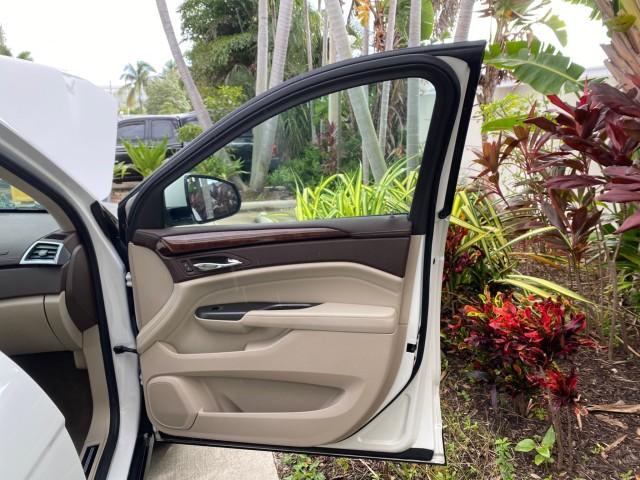 2012 Platinum Ice Tricoat /Shale w/Brownstone accents Cadillac SRX Luxury Collection LOW MILES 44,412 AWD (3GYFNDE32CS) with an 3.6L SIDI DOHC V6 VVT Engine engine, Automatic transmission, located at 4701 North Dixie Hwy, Pompano Beach, FL, 33064, (954) 422-2889, 26.240938, -80.123474 - OUR WEBPAGE FLORIDACARS1.COM HAS OVER 100 PHOTOS AND FREE CARFAX LINK 2012 Cadillac SRX Luxury Collection 1 OWNER 4 Door Wagon/Sport Utility 3.6L V6 F DOHC 24V Gasoline 24 MPG All Wheel Drive Features 4WD/AWD ABS Brakes Air Conditioning Alloy Wheels AM/FM Stereo Automatic Transmission Auxiliary Audi- Photo#11