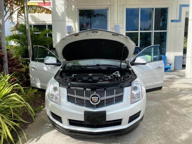 2012 Platinum Ice Tricoat /Shale w/Brownstone accents Cadillac SRX Luxury Collection LOW MILES 44,412 AWD (3GYFNDE32CS) with an 3.6L SIDI DOHC V6 VVT Engine engine, Automatic transmission, located at 4701 North Dixie Hwy, Pompano Beach, FL, 33064, (954) 422-2889, 26.240938, -80.123474 - OUR WEBPAGE FLORIDACARS1.COM HAS OVER 100 PHOTOS AND FREE CARFAX LINK 2012 Cadillac SRX Luxury Collection 1 OWNER 4 Door Wagon/Sport Utility 3.6L V6 F DOHC 24V Gasoline 24 MPG All Wheel Drive Features 4WD/AWD ABS Brakes Air Conditioning Alloy Wheels AM/FM Stereo Automatic Transmission Auxiliary Audi- Photo#16