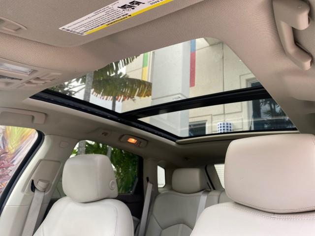2012 Platinum Ice Tricoat /Shale w/Brownstone accents Cadillac SRX Luxury Collection LOW MILES 44,412 AWD (3GYFNDE32CS) with an 3.6L SIDI DOHC V6 VVT Engine engine, Automatic transmission, located at 4701 North Dixie Hwy, Pompano Beach, FL, 33064, (954) 422-2889, 26.240938, -80.123474 - OUR WEBPAGE FLORIDACARS1.COM HAS OVER 100 PHOTOS AND FREE CARFAX LINK 2012 Cadillac SRX Luxury Collection 1 OWNER 4 Door Wagon/Sport Utility 3.6L V6 F DOHC 24V Gasoline 24 MPG All Wheel Drive Features 4WD/AWD ABS Brakes Air Conditioning Alloy Wheels AM/FM Stereo Automatic Transmission Auxiliary Audi- Photo#58