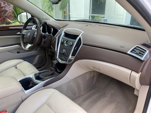 2012 Platinum Ice Tricoat /Shale w/Brownstone accents Cadillac SRX Luxury Collection LOW MILES 44,412 AWD (3GYFNDE32CS) with an 3.6L SIDI DOHC V6 VVT Engine engine, Automatic transmission, located at 4701 North Dixie Hwy, Pompano Beach, FL, 33064, (954) 422-2889, 26.240938, -80.123474 - OUR WEBPAGE FLORIDACARS1.COM HAS OVER 100 PHOTOS AND FREE CARFAX LINK 2012 Cadillac SRX Luxury Collection 1 OWNER 4 Door Wagon/Sport Utility 3.6L V6 F DOHC 24V Gasoline 24 MPG All Wheel Drive Features 4WD/AWD ABS Brakes Air Conditioning Alloy Wheels AM/FM Stereo Automatic Transmission Auxiliary Audi- Photo#91
