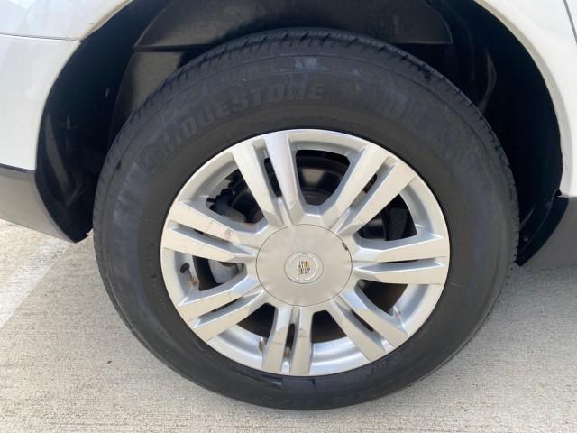 2012 Platinum Ice Tricoat /Shale w/Brownstone accents Cadillac SRX Luxury Collection LOW MILES 44,412 AWD (3GYFNDE32CS) with an 3.6L SIDI DOHC V6 VVT Engine engine, Automatic transmission, located at 4701 North Dixie Hwy, Pompano Beach, FL, 33064, (954) 422-2889, 26.240938, -80.123474 - OUR WEBPAGE FLORIDACARS1.COM HAS OVER 100 PHOTOS AND FREE CARFAX LINK 2012 Cadillac SRX Luxury Collection 1 OWNER 4 Door Wagon/Sport Utility 3.6L V6 F DOHC 24V Gasoline 24 MPG All Wheel Drive Features 4WD/AWD ABS Brakes Air Conditioning Alloy Wheels AM/FM Stereo Automatic Transmission Auxiliary Audi- Photo#99