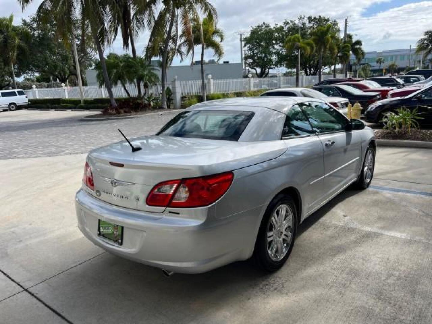 2008 Silver Steel Metallic /Slate Gray Chrysler Sebring Limited LOW MILES 38,605 (1C3LC65M68N) with an 3.5L SOHC MPI 24-Valve HO V6 Engine engine, Automatic transmission, located at 4701 North Dixie Hwy, Pompano Beach, FL, 33064, (954) 422-2889, 26.240938, -80.123474 - 2008 CHRYSLER SEBRING LIMITED NEW $36,230 ROAD READY VIN: 1C3LC65M68N292663 NO ACCIDENTS NO RECALLS CONVERTIBLE POWER CONVERTIBLE TOP 3.5L V6 F DOHC 24V LIMITED LOW MILES 36,604 3.5L V6 GASOLINE POWER MIRRORS POWER HEATED SEATS/MIRRORS FRONT WHEEL DRIVE BLUETOOTH 6 SERVICE RECORDS DVD Alloy Wheels A - Photo#7