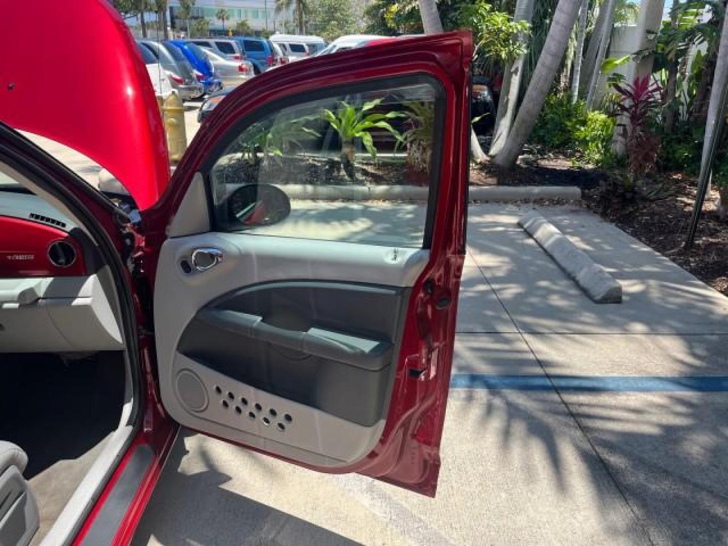 2008 Inferno Red Crystal Pearl /Pastel Slate Gray Chrysler PT Cruiser Touring 2.4 TURBO LOW MILES 51,572 (3A8FY58868T) with an 2.4L DOHC 16-Valve Turbo I4 Engine engine, Automatic transmission, located at 4701 North Dixie Hwy, Pompano Beach, FL, 33064, (954) 422-2889, 26.240938, -80.123474 - 2008 CHRYSLER PT CRUISER TOURING ROAD READY VIN: 3A8FY58868T133248 2.4L I4 TURBO VAN NO ACCIDENTS 2.4L I4 F DOHC 16V POWER SUNROOF NO RECALLS GASOLINE POWER SEATS FLORIDA OWNER FRONT WHEEL DRIVE 17 SERVICE RECORDS LOW MILES 51,572 Additional Airbags Adjustable Lumbar Support Alloy Wheels Anti-Theft - Photo#11