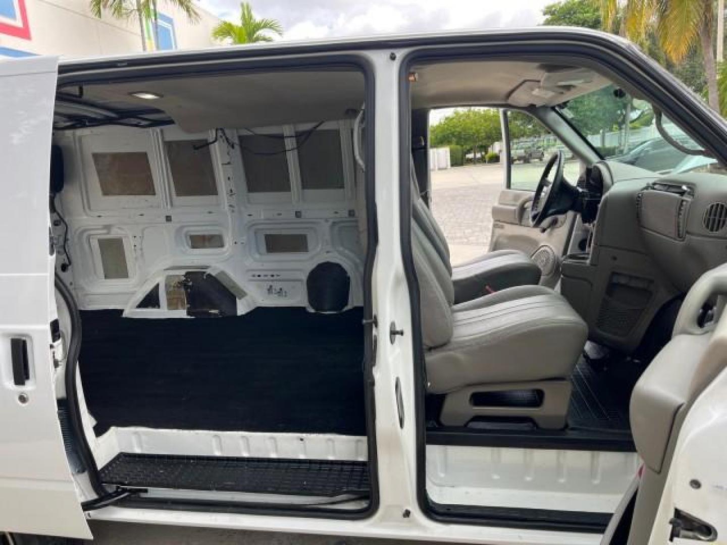 2005 Summit White /Medium Gray Chevrolet Astro Cargo Van LOW MILES 82,583 (1GCDM19X45B) with an 4.3L Vortec 4300 V6 MFI Engine engine, Automatic transmission, located at 4701 North Dixie Hwy, Pompano Beach, FL, 33064, (954) 422-2889, 26.240938, -80.123474 - OUR WEBPAGE FLORIDACARS1.COM HAS OVER 100 PHOTOS AND FREE CARFAX LINK 2005 CHEVROLET ASTRO ROAD READY WORK READY VIN: 1GCDM19X45B109424 NO ACCIDENTS NO RECALLS VAN LOW MILES 82,583 4.3L V6 F FLORIDA OWNER 4.3L V6 GASOLINE 4 SERVICE RECORDS REAR WHEEL DRIVE Anti-Theft System Automatic Climate Control - Photo#13